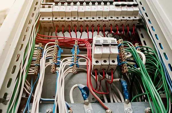 Industrial electrical contractor installing electrical panel in commercial facility, Sumter SC